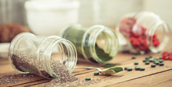 Goji, spirulina and chia seeds (superfood) on wooden tabe