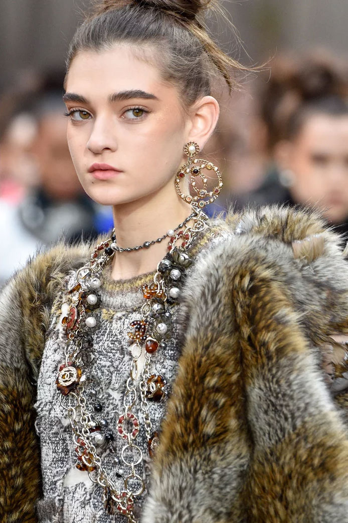 Logo earrings at Chanel